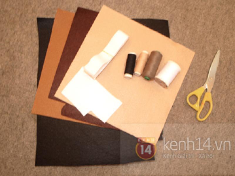 Nhặt vải dạ may gấu xinh cuộn dây sạc